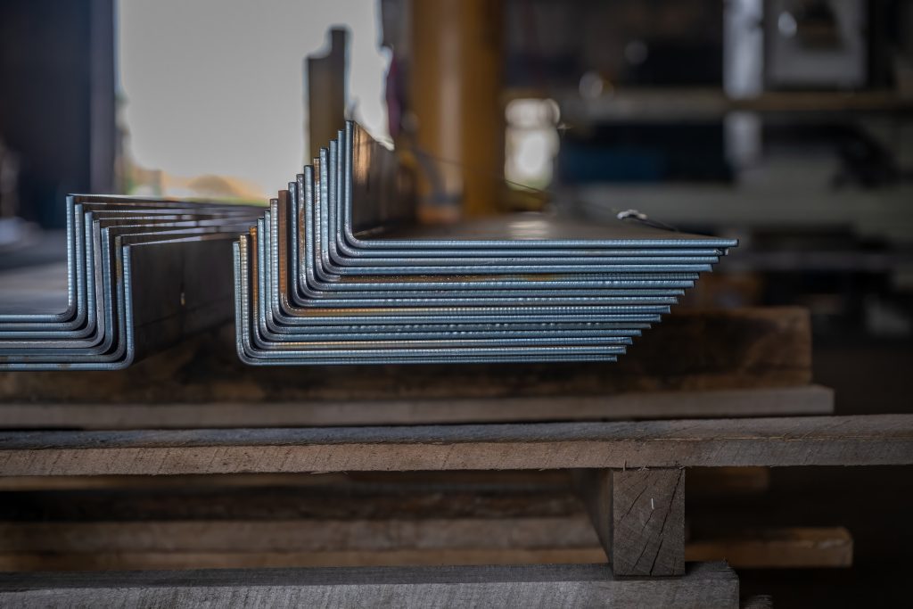 Metal Forming Metal Sheets bent stacked on eachother