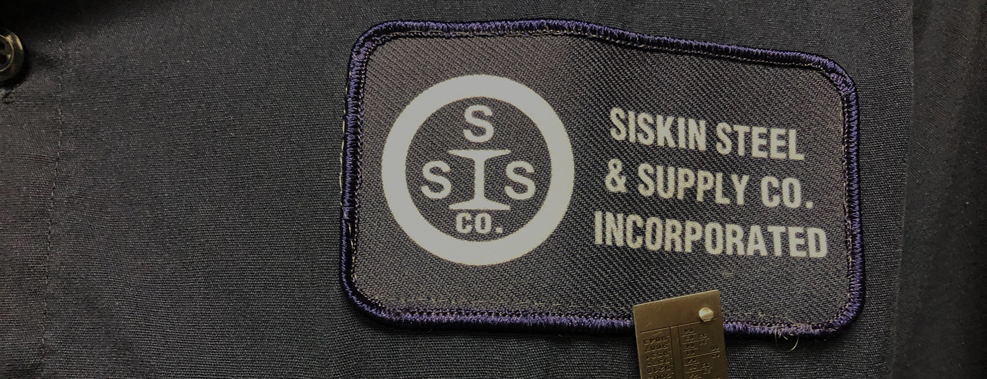 Siskin Steel Uniform Badge