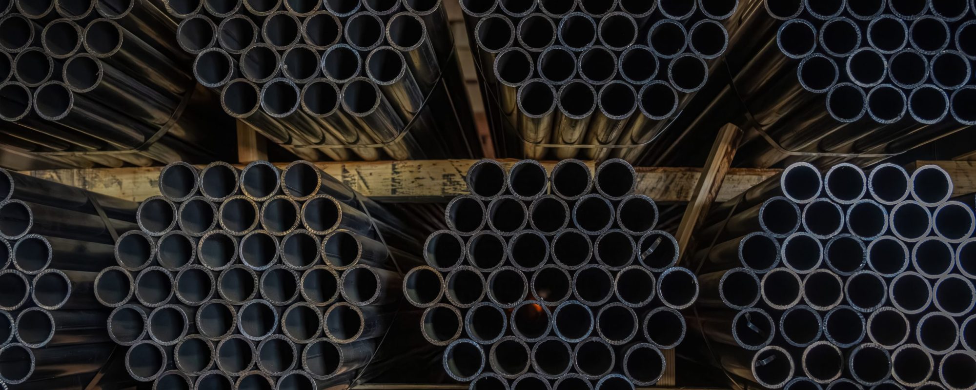 Pipes organized on three shelves in the shape of an octagon